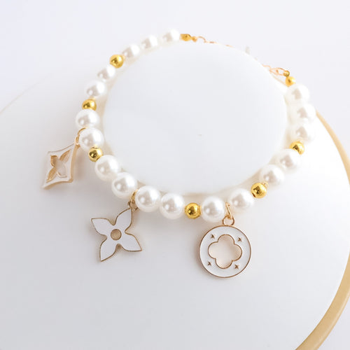 Cross-border hot-selling pet collar kitten dog bell pearl necklace lady jewelry four-leaf clover pet collar