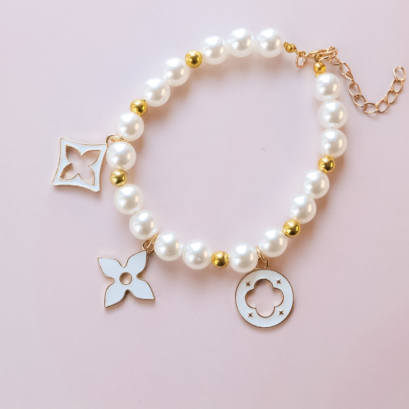 Cross-border hot-selling pet collar kitten dog bell pearl necklace lady jewelry four-leaf clover pet collar